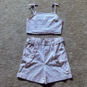 It’s a kids two piece set, XL, pale pink